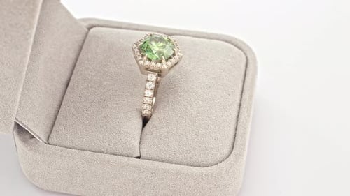 Elegant Ring with Green Gem in Velvet Box