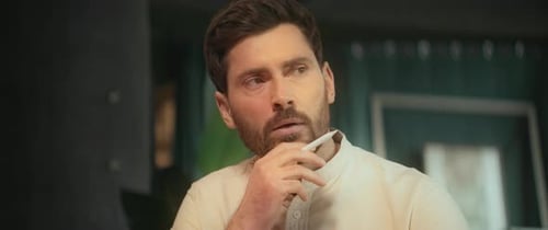 Attractive Bearded Man Sitting at Desk in Home Office Thinking Hold Pen Camera Moving Around 360