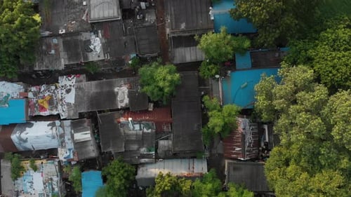 Aerial top down of poor slum area with destroyed buildings in Chennai,India.