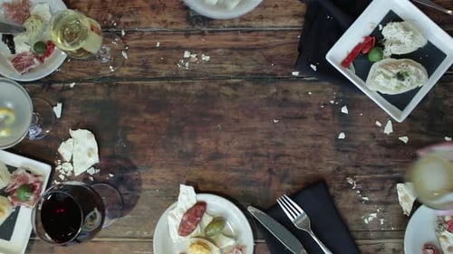 Friends around table at trendy restaurant. Food and beverage ending title or logo clip.