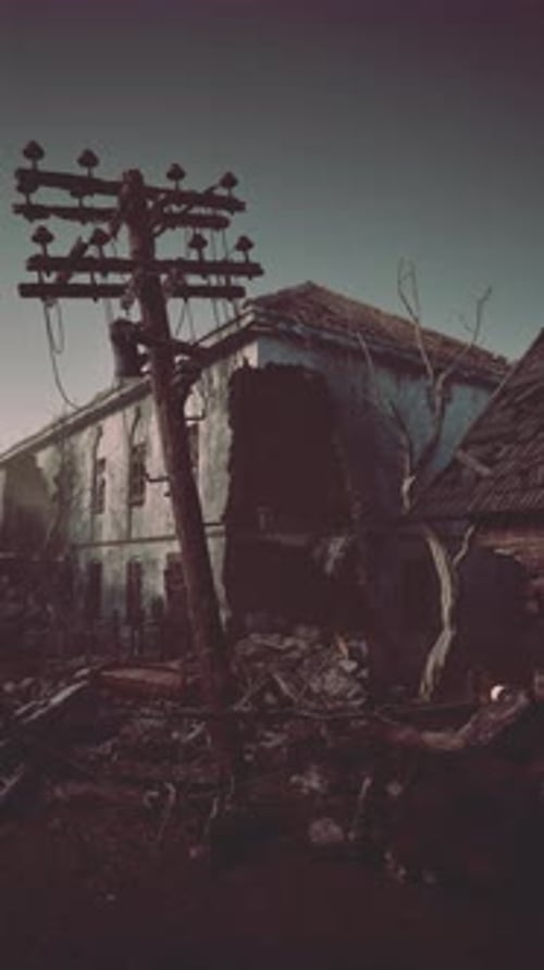 Dilapidated Building With Telephone Pole