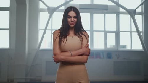 Beautiful Slim Girl in Sportswear Looks Seductively Camera After Workout