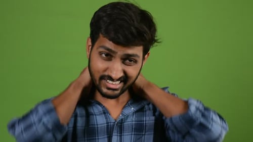 Man Feeling irritaed in summer cause of the heat in green screen