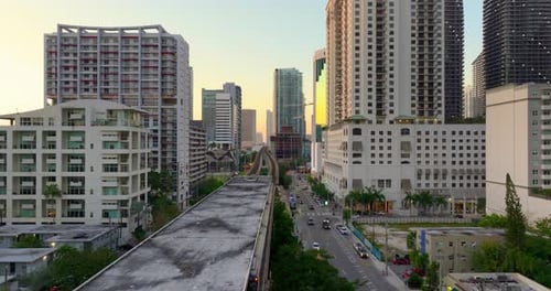 View From Above of Public Train Passing Through Downtown Railroad of Miami Florida USA Financial