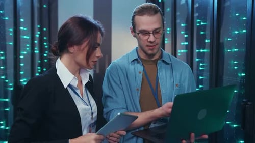 Team Analyzing Data Servers in Modern Data Center