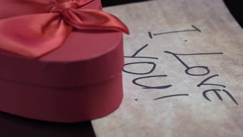 I Love You Message With Red Hart Shaped Gift Box For Valentines Day. Close Up