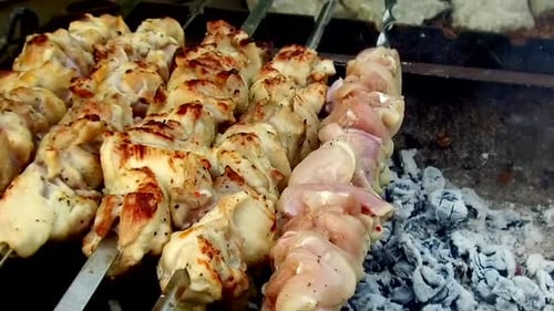 Chicken Kabobs Cooking Over Charcoal Grill