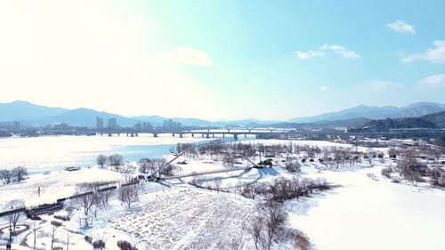 Cinematic Drone Shot of Namyangju Garden of Water and Frozen Han River in Winter 006