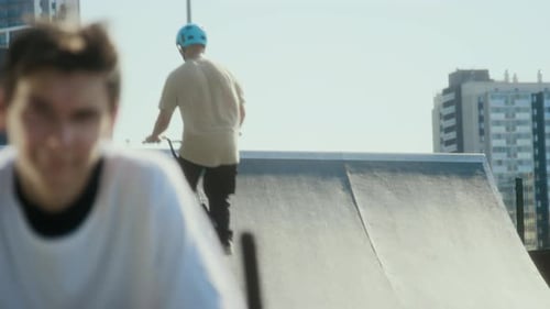 Person on BMX Bike Trick at Skate Park