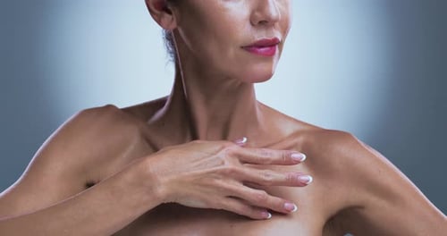 Body care, hands and skincare with woman in studio for cosmetics, dermatology or wellness