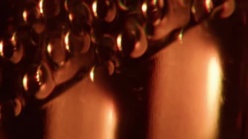 Abstract Flickering Amber Light Reflections with Bokeh