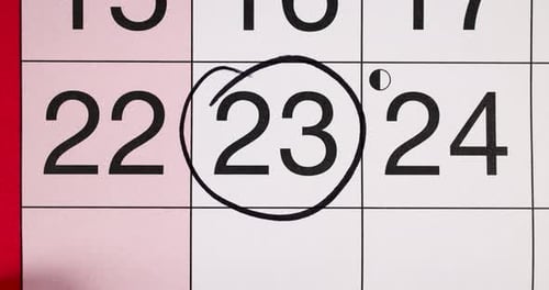 Footage of a calendar showing the date 23rd reminder concept for the 23rd day of the month