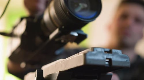 Camera Lens Attachment to Camera Body on Tripod