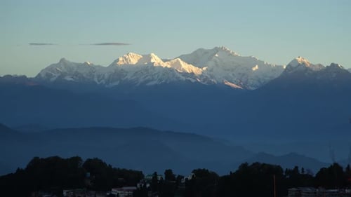 Kanchenjunga mountain is visible in the distance..