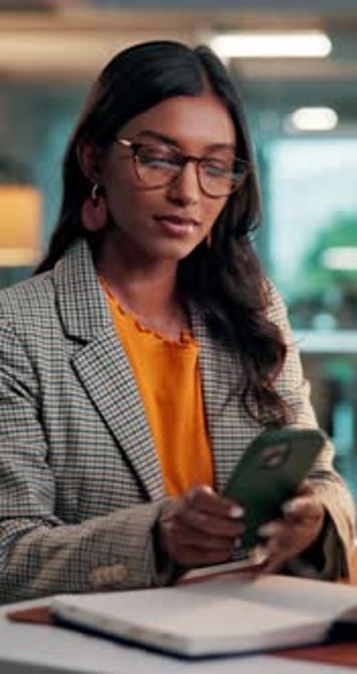 Phone, message and woman with scroll in office for creative project or online article