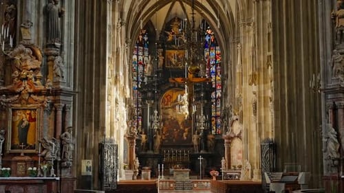Interior of St. Stephen's Cathedral, Stephansdom, with ornate stained glass windows & baroque gothic