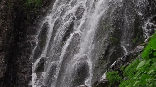 A Beautiful Tropical Waterfall Water From a Mountain River Falls Down the Stone Cascades Pure Water