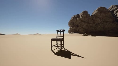 A Chair Sitting in the Middle of a Desert