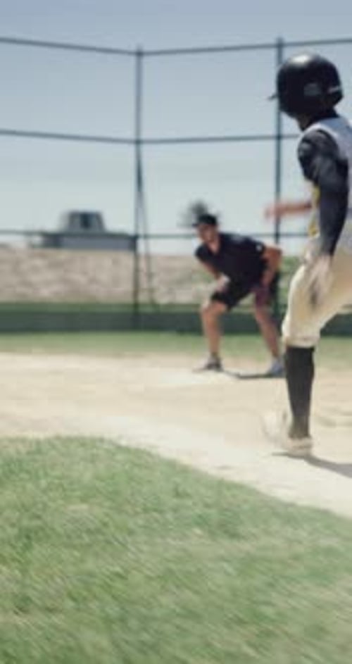 Running, man and slide on field for baseball, fitness and competition with game action