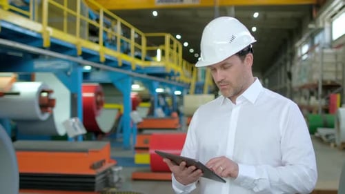 Industrial Worker Engineer Man with Tablet at Factory Heavy Machine Metal Manufacturing Equipment