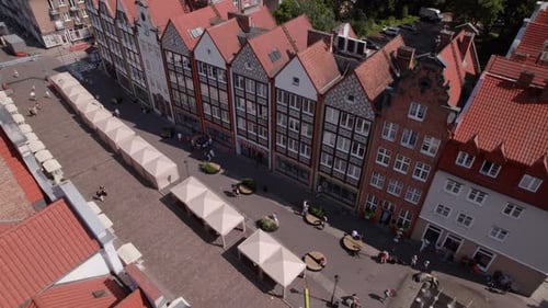 Drone Flight Across the Old Town Tiled Roofs in the Center of Gdansk Poland