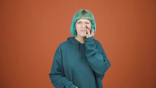 Young woman with wrinkles and problems on her skin is unhappy.