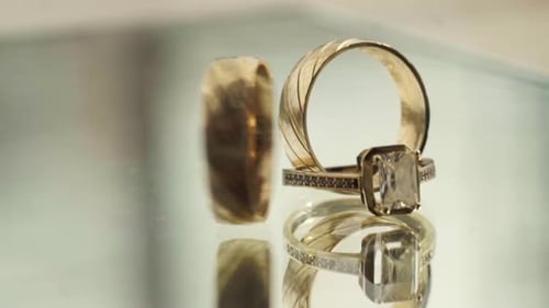 Close Up of Gold Engagement and Wedding Rings