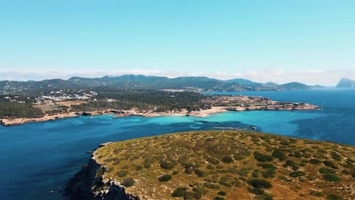 Aerial drone view of Cala Comte in Ibiza. very popular beach in Spain.