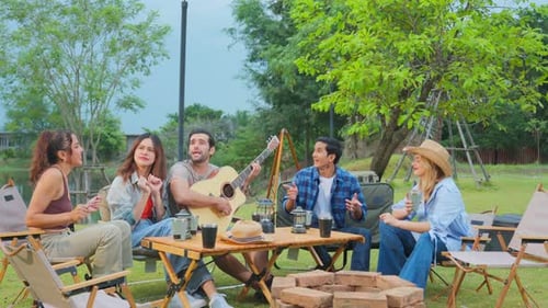 Friends Gather for Music and Fun Outdoors