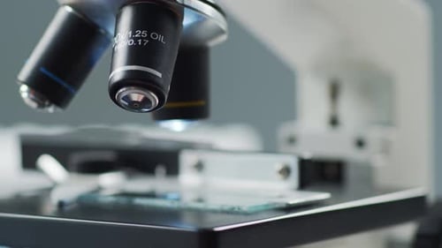 Closeup of Scientific Microscope Laboratory in Hospital Epidemic Disease Healthcare Vaccine Research