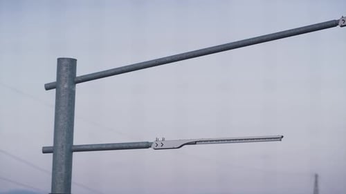 Powerful Street Lamps at Clear Sky Closeup. Modern Lampposts on High Metal