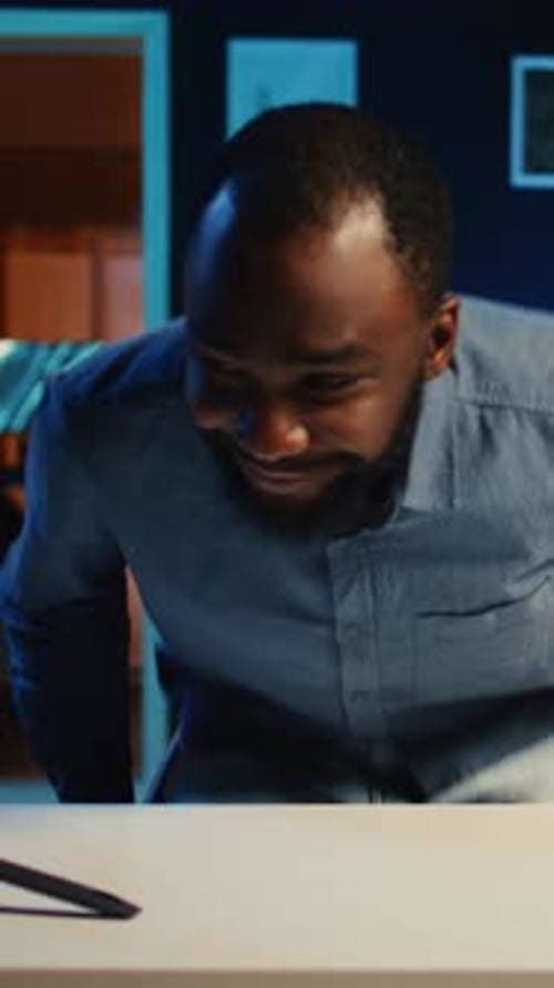 Man Recording Broadcast in His Home Studio