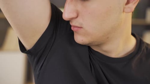 Armpit sweat odor.