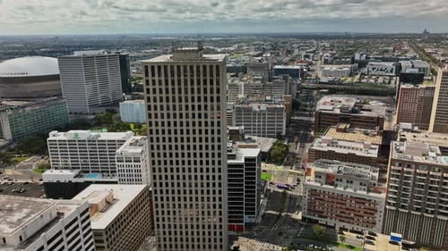 An aerial view of a city with tall buildings