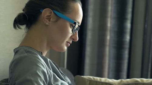 Woman Using Laptop Computer Indoors