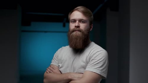 Portrait of Adult Bearded Man Looking at Camera with Confident Face Expression