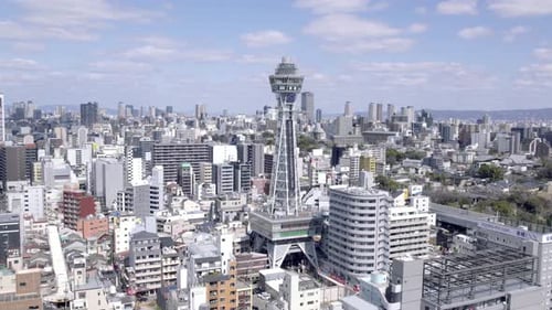 Drone circling Tsutenkaku Tower, Osaka Japan