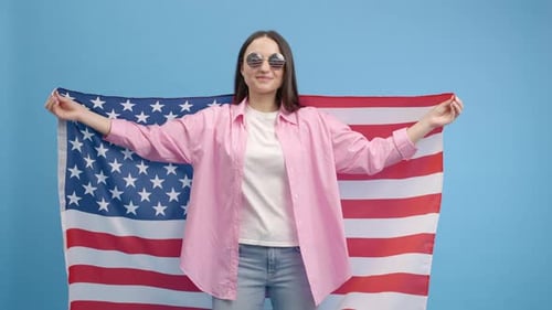 Woman Holding American Flag With Star Sunglasses Smiling