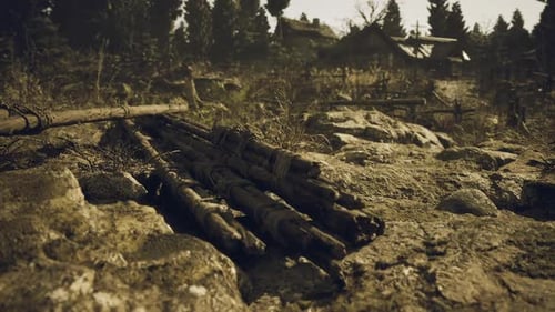 Abandoned Wooden Logs Lay on a Rocky Surface in a Desolate Landscape