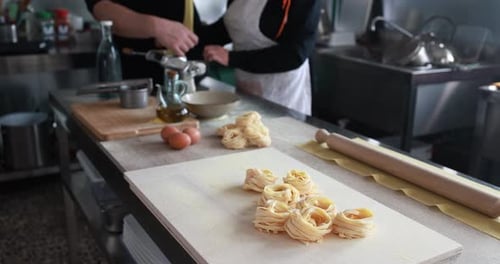 People Working Inside Pasta Factory Background