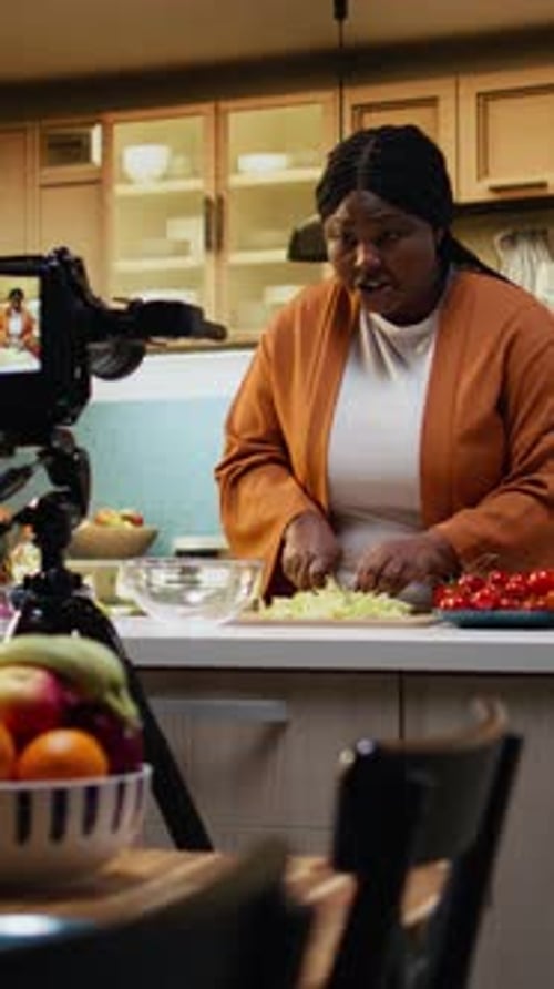 Food Vlogger African American Cutting Salad Leaves for Meal Prep