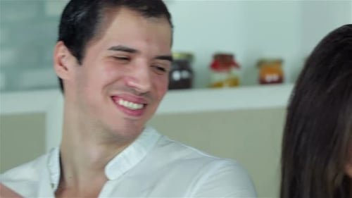 Smiling Man and Woman Together Indoors