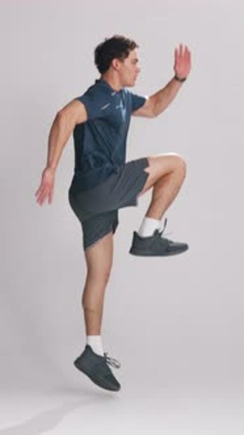 Personal trainer, athlete and jump in studio for workout training, exercise performance and cardio