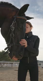 A Teenage Girl Feeds a Horse with Fodder, People Stock Footage ft ...