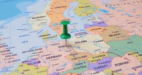 Germany - Travel concept with green pushpin on the world map. The location point on the map points