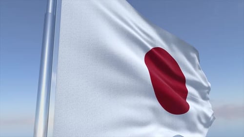 Waving Japan Flag Against Blue Sky Background