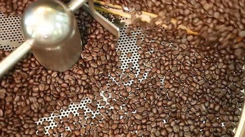 Roasting Coffee Beans Inside Rotating Drum
