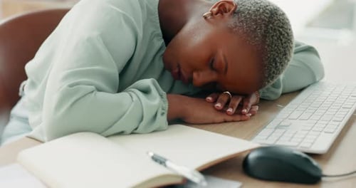Sleeping, tired and burnout business woman feeling exhausted and boring after overtime