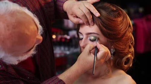 Makeup Artist Applying Eyeshadow for Beauty Makeup Model Closeup Eyes Eyeshadow Beautiful Young