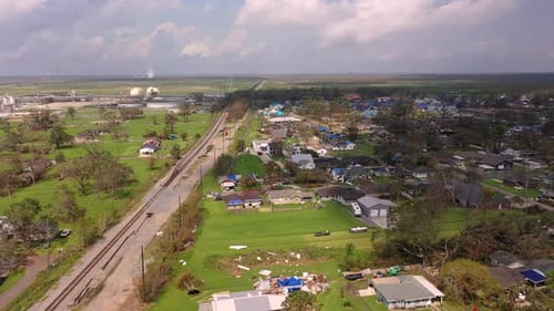 Nearby refineries in NORCO and damaged homes post hurricane Ida